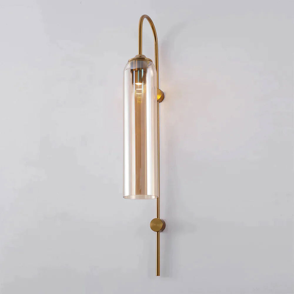 Modern glass wall lamp detail of the brass arm and glass tube