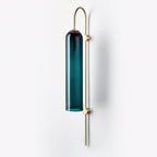 Modern glass wall lamp mounted on a feature wall