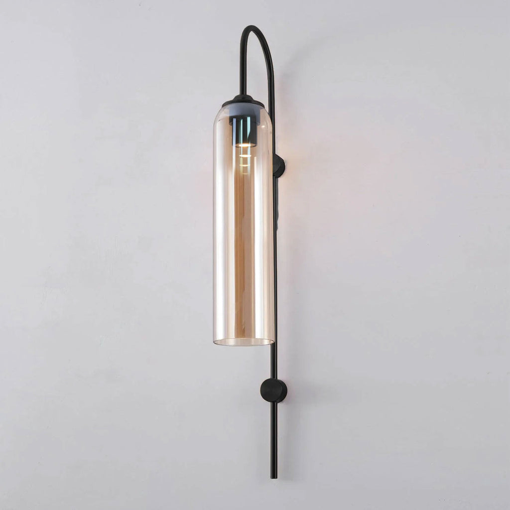 Modern glass wall lamp close-up of the brass arm curve