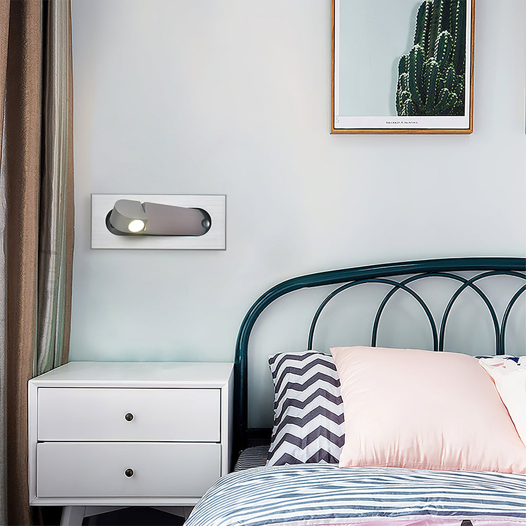 LED bedside reading light shown in a warm bedroom scene