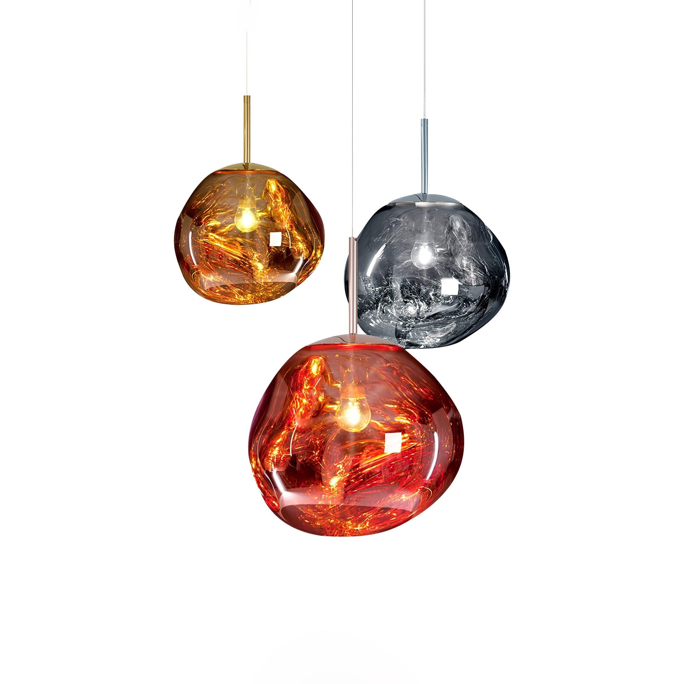 Molten pendant light glowing over a stairwell space
