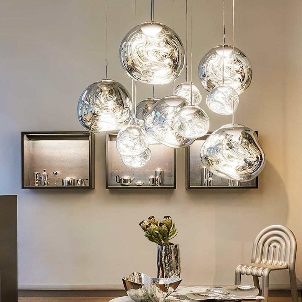 Molten-form pendant light shown against a plain wall