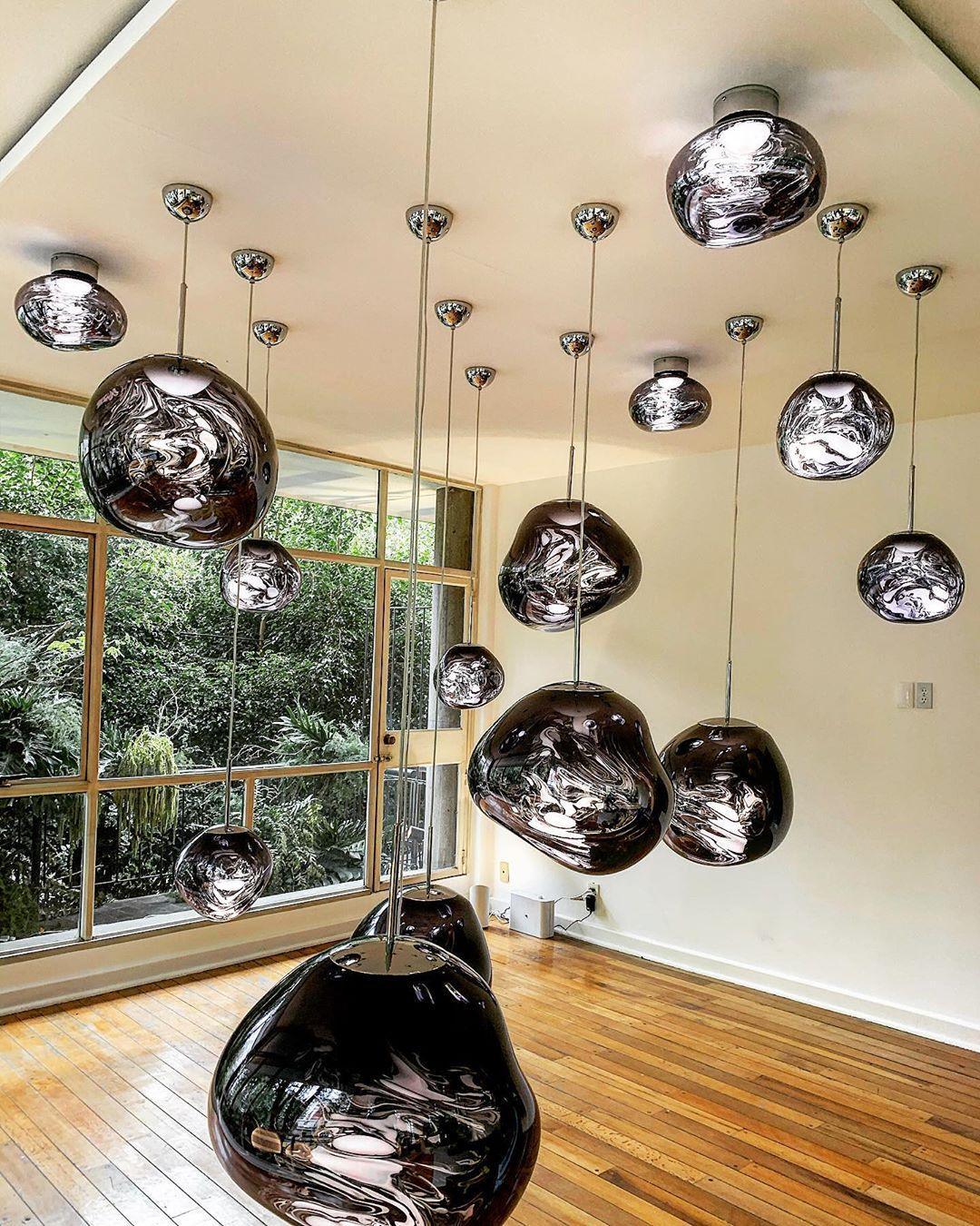 Sculptural lava pendant light shade frozen in a molten shape