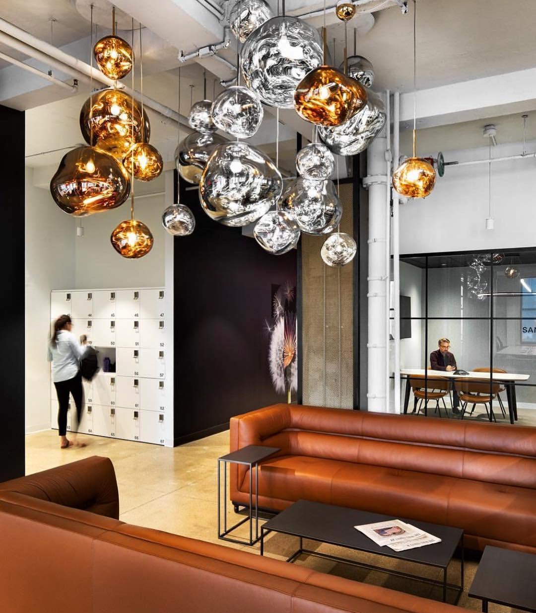 Sculptural lava pendant light with a mirror-effect shade