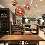 Lava pendant light hanging over a calm reading corner