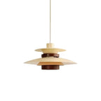 A beige Clérachic pendant with a walnut ring, unlit, on a plain white backdrop.