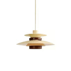 Angled view of the beige shades and walnut ring on this Clérachic pendant, unlit.