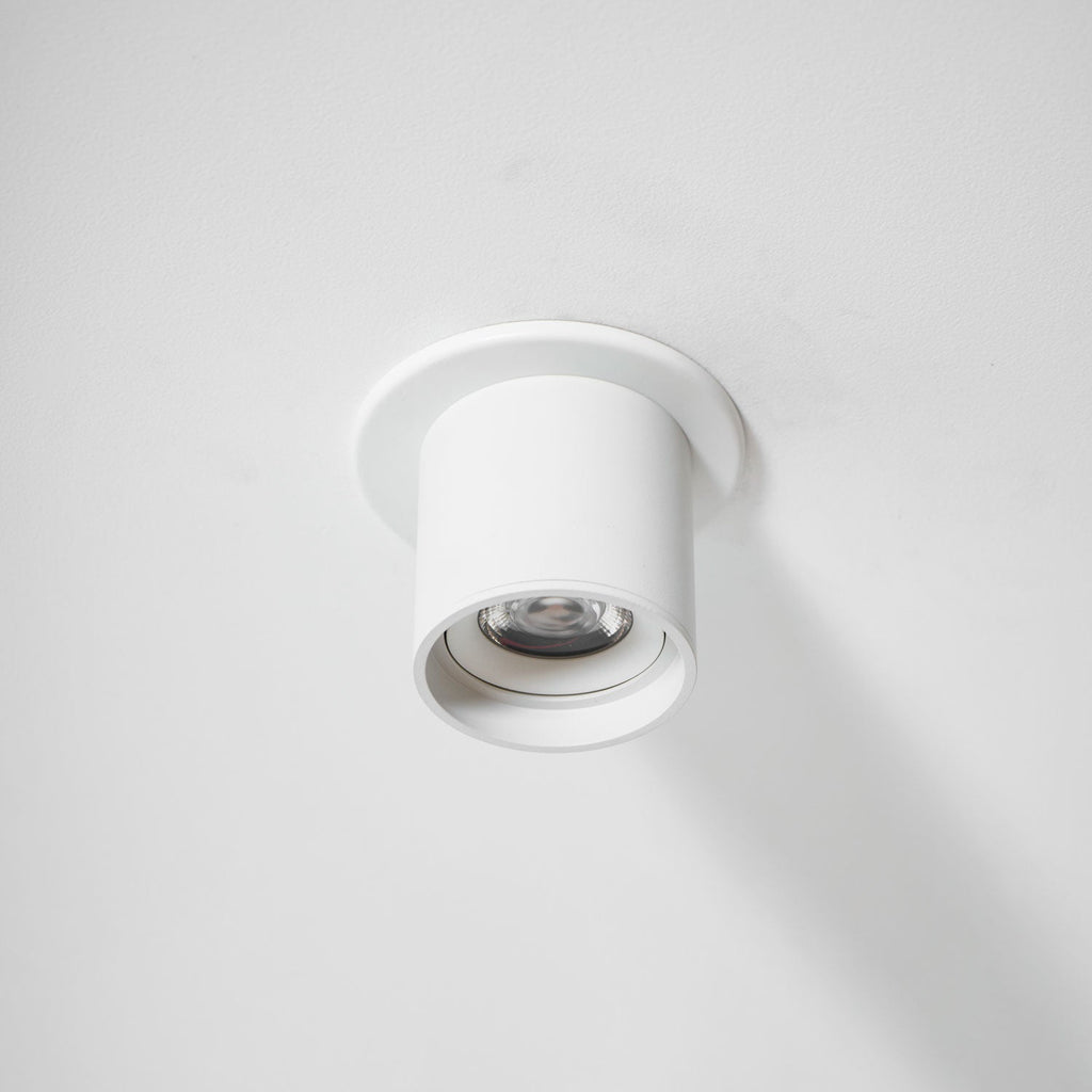 Modupoint ceiling light with a deep ridged rim mounted on a modern ceiling