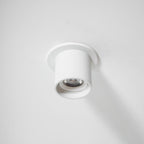 Modupoint ceiling light with a deep ridged rim mounted on a modern ceiling
