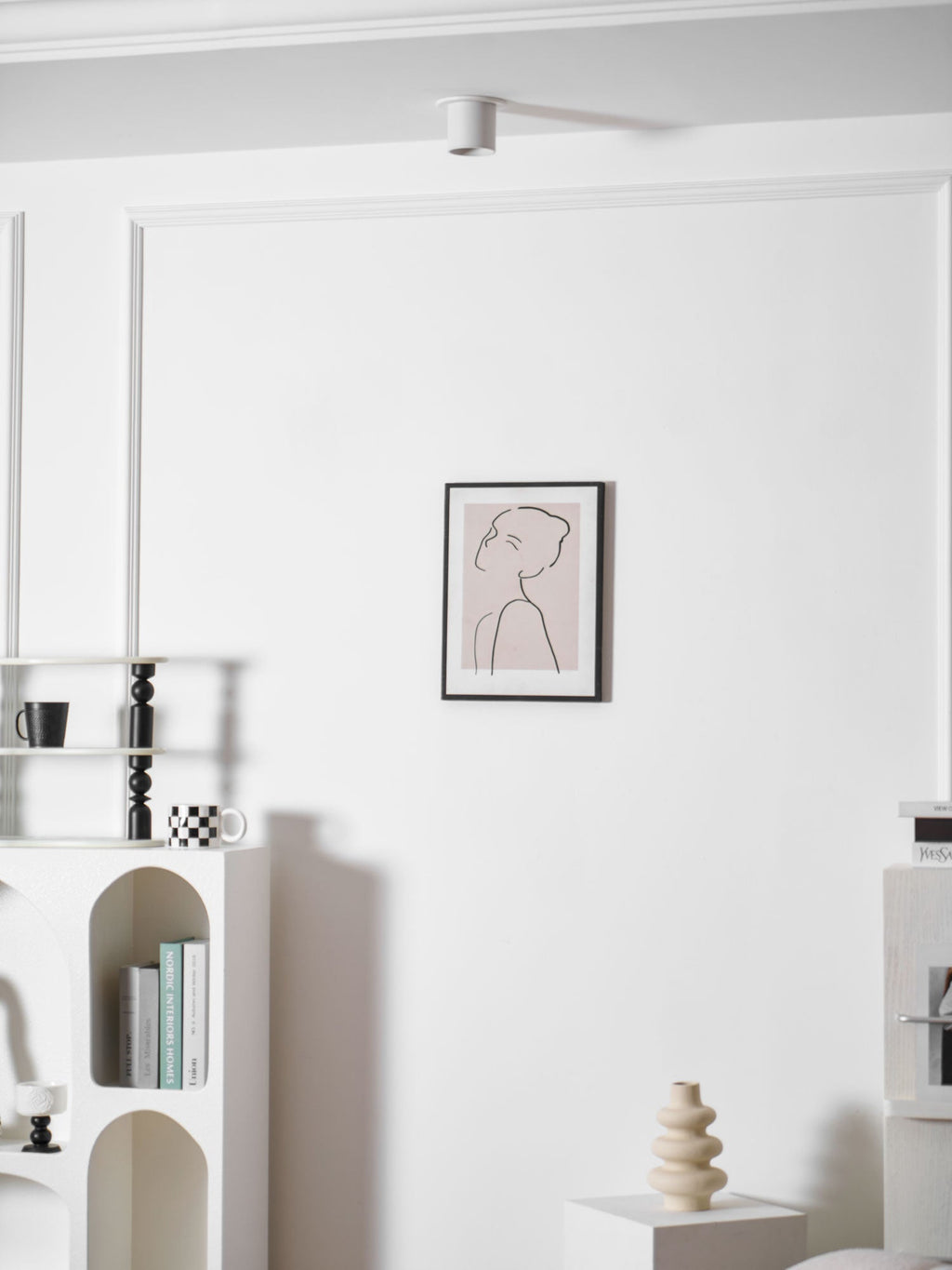 Modupoint ceiling light in white casting an even, low-glare pool of light