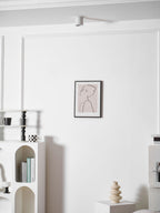 Modupoint ceiling light in white casting an even, low-glare pool of light