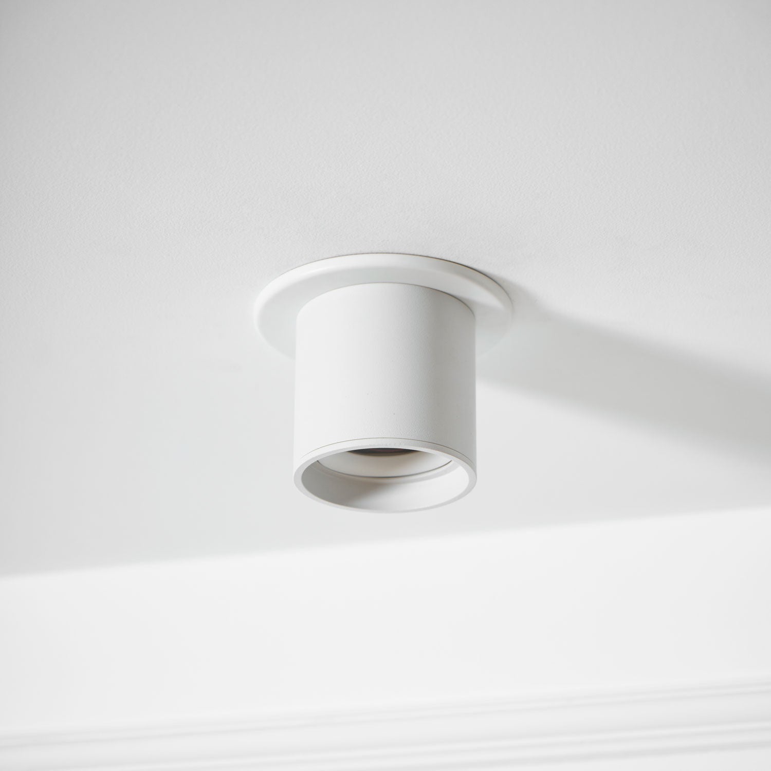 Modupoint ceiling light viewed from an angle highlighting the deep rim