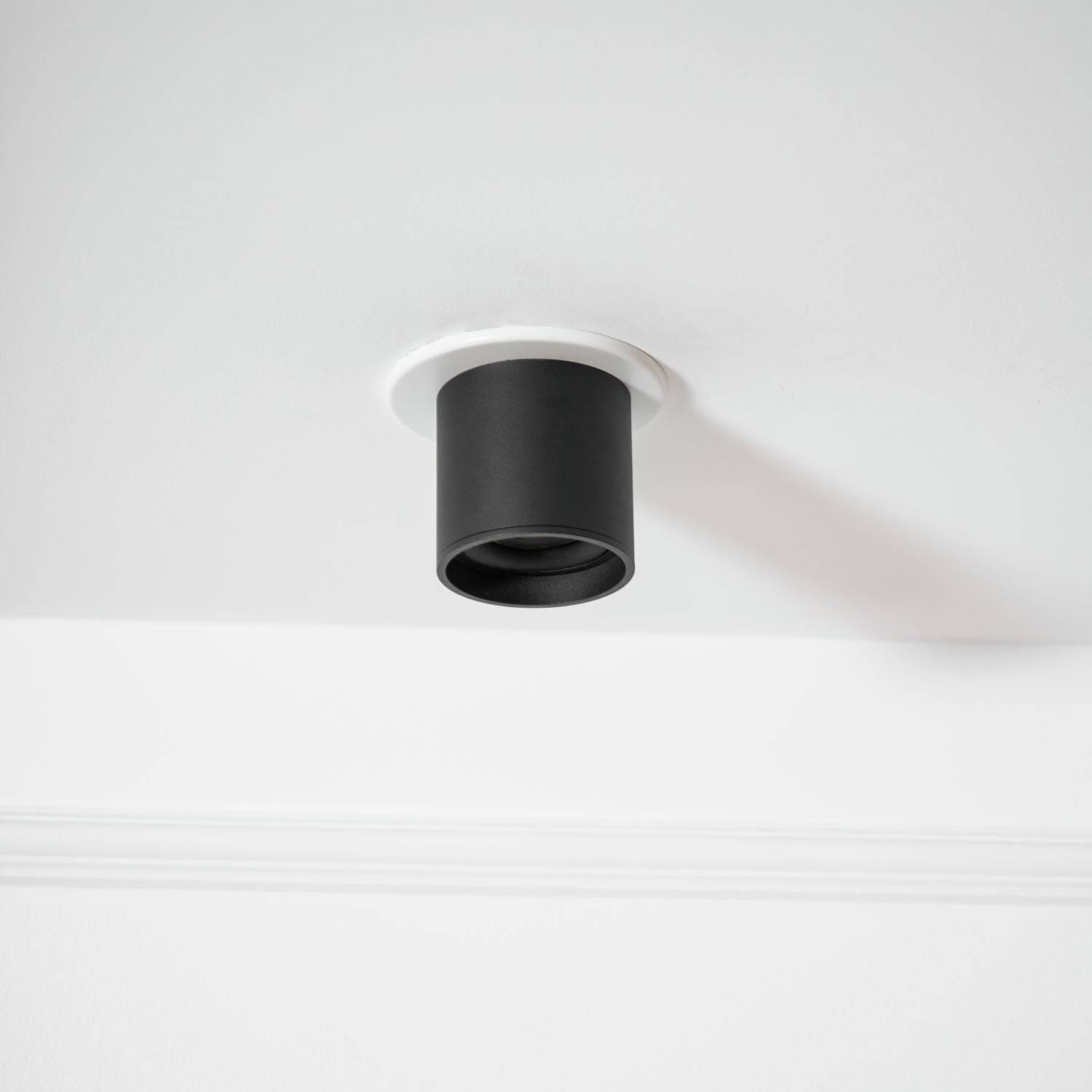 Modupoint ceiling light viewed from an angle highlighting the deep rim