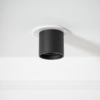 Modupoint ceiling light with a deep ridged rim mounted on a modern ceiling