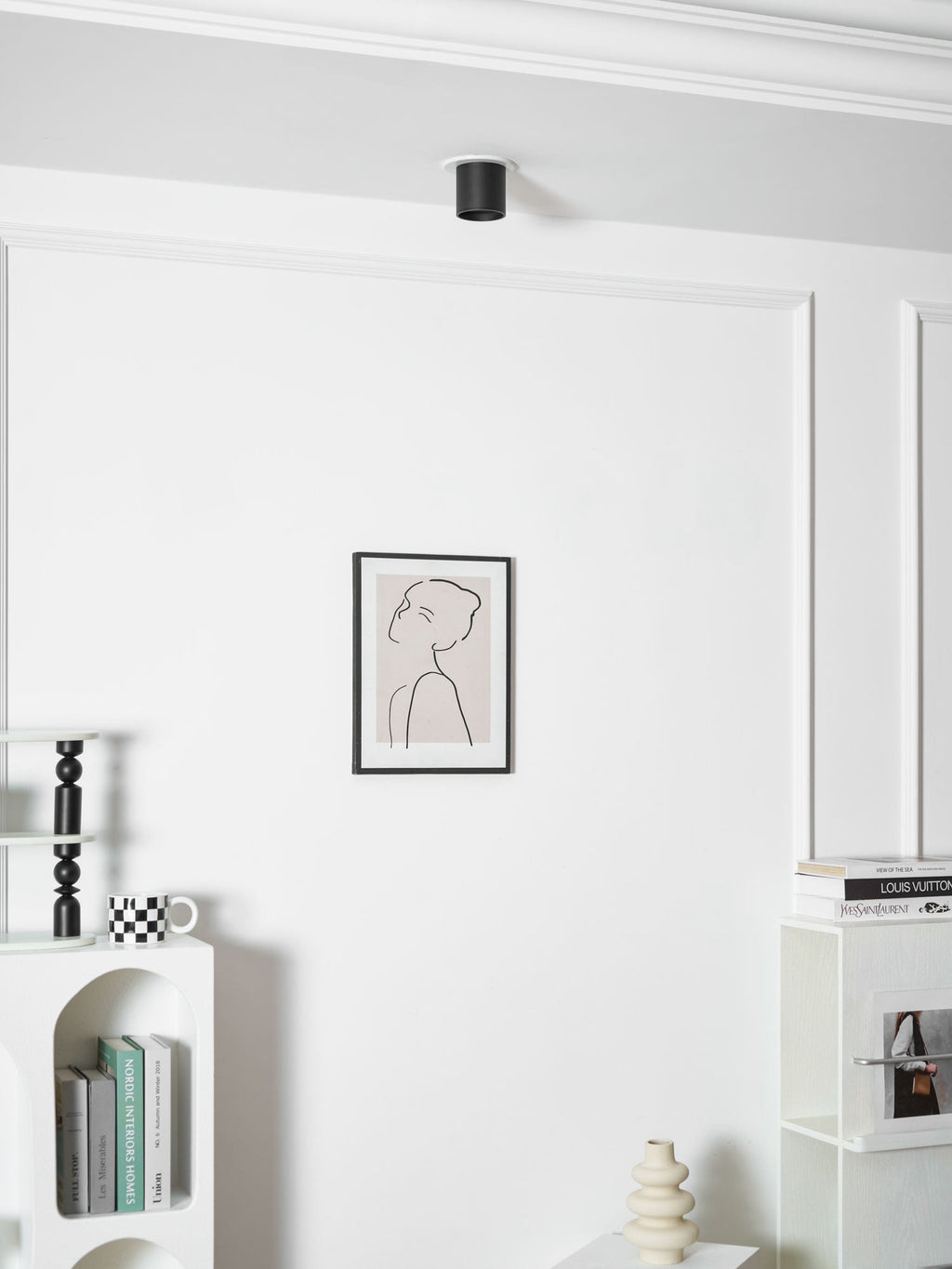 Modupoint ceiling light mounted on a wall as an accent light