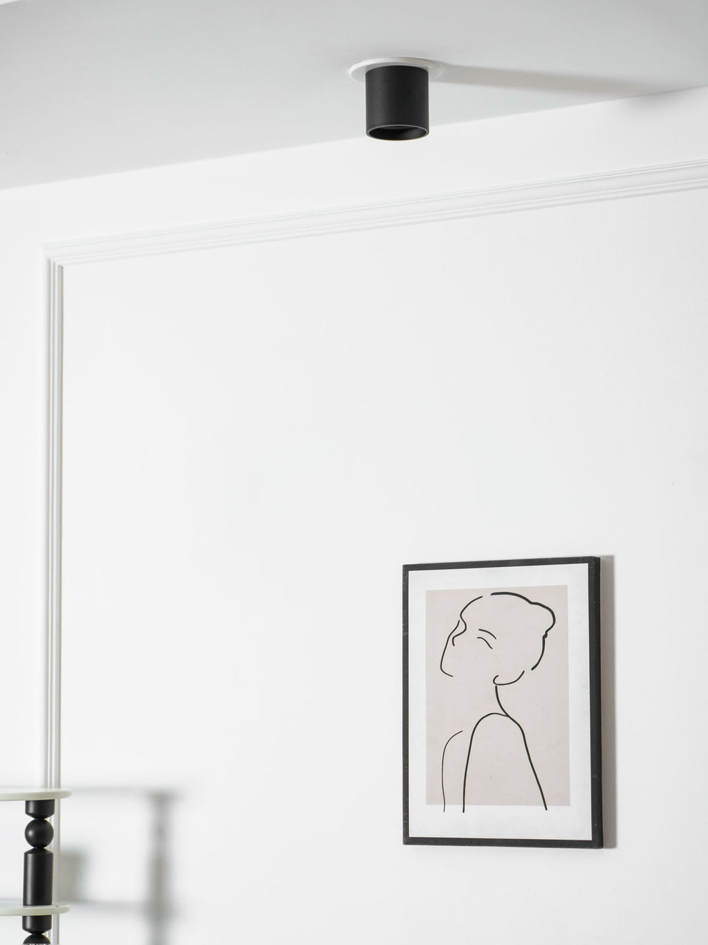 Modupoint ceiling light viewed from an angle highlighting the deep rim