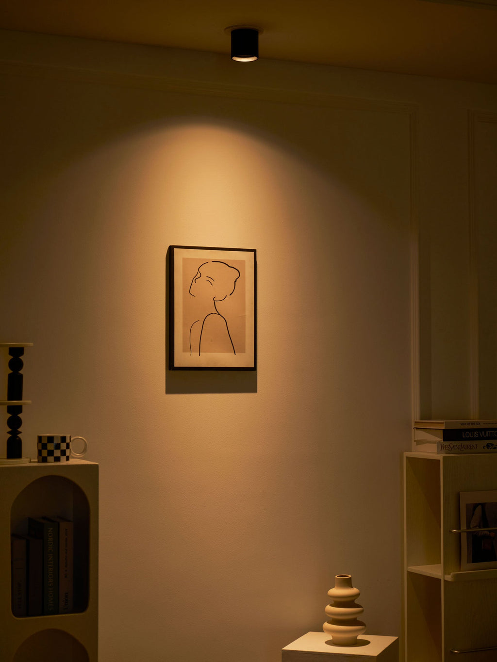 Modupoint ceiling light in white casting an even, low-glare pool of light