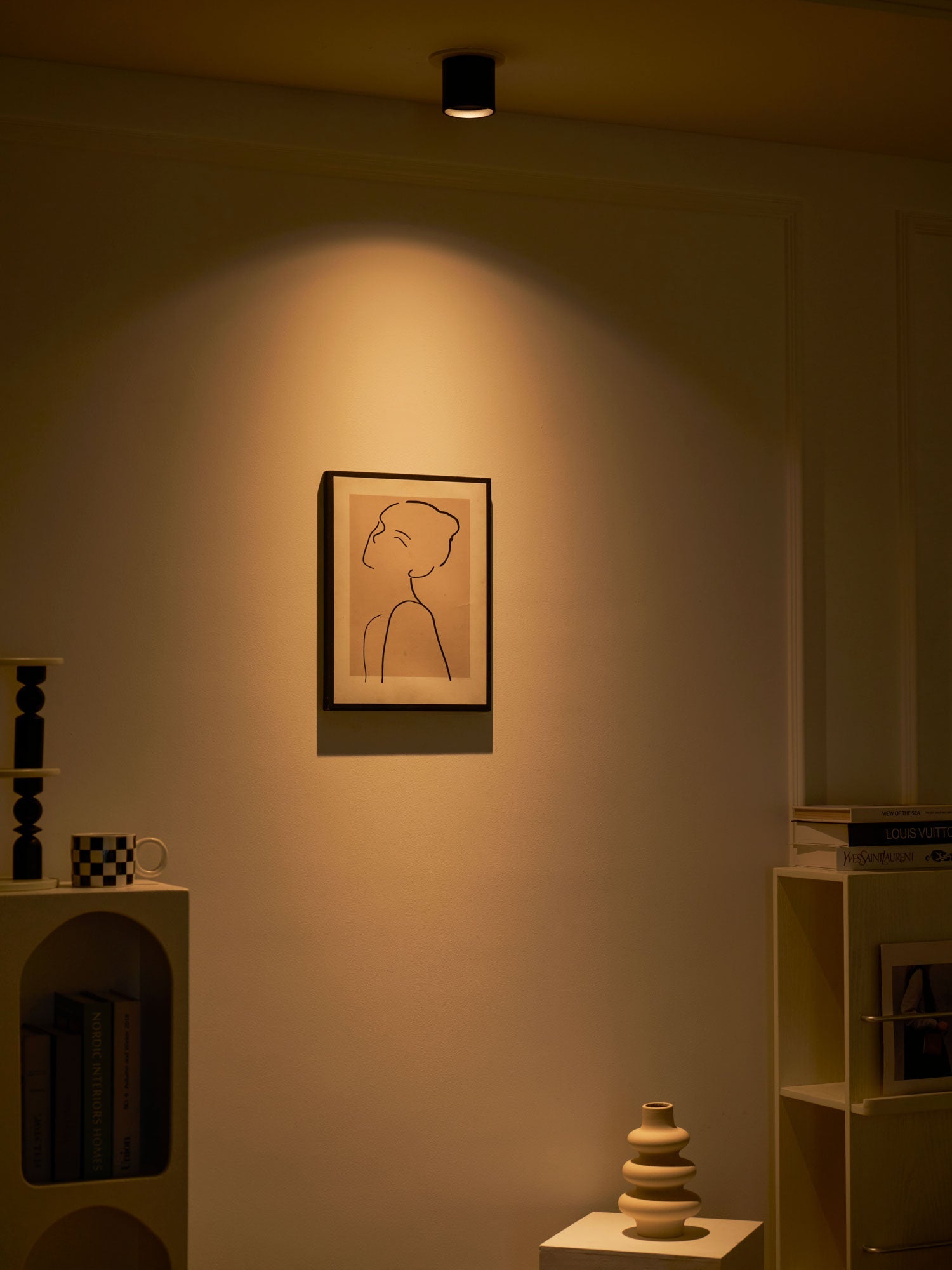 Modupoint ceiling light in white casting an even, low-glare pool of light