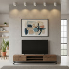 Modupoint ceiling light shown lit in a warm white tone in a styled interior