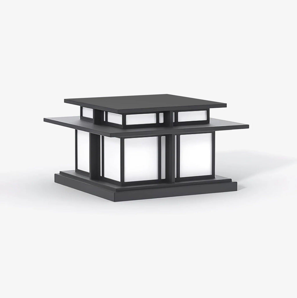 Unlit, this Clérachic pillar light sits on a plain grey backdrop, showing its dark frame and frosted glass panels.