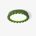 This Clérachic ceiling light in green, unlit, sits alone on a plain white background.