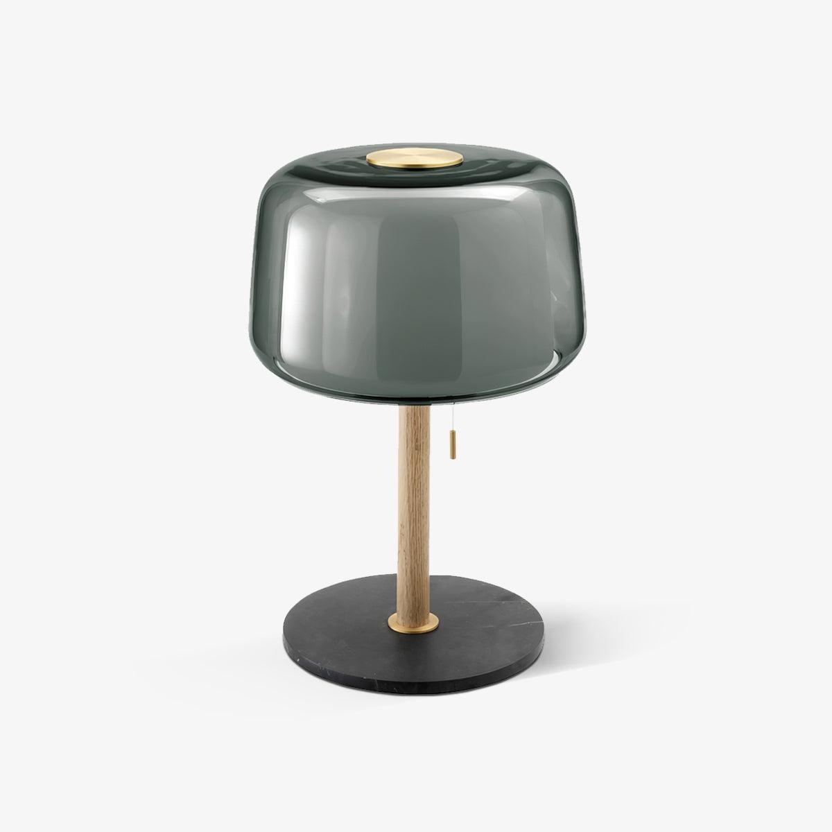 Clérachic lamp with a smoked-grey glass shade on an oak stem and black marble base, shown alone against a pale backdrop.