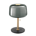 Clérachic lamp shown unlit at a slight angle against a plain white backdrop, its full form visible.