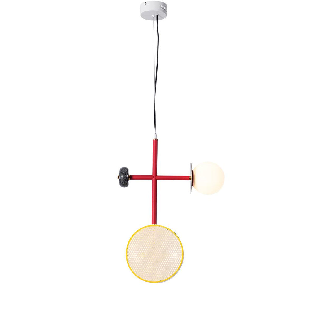 Full studio shot of a Clérachic two-armed pendant with red rod, dark bead joint, cane drum and opal glass globe, ceiling plate visible above.