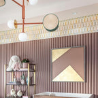 Larger Clérachic chandelier hanging against striped, ribbed pink wallpaper, near a shelf styled with toys in a nursery.