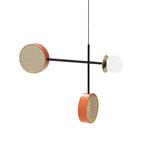 Two-armed Clérachic pendant with a black rod, copper cane drum and opal glass globe, plus a second drum shade below, on white.