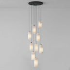 Monty alabaster pendant 9-head cluster lit in a stairwell