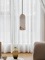 Monty alabaster pendant styled in a warm foyer