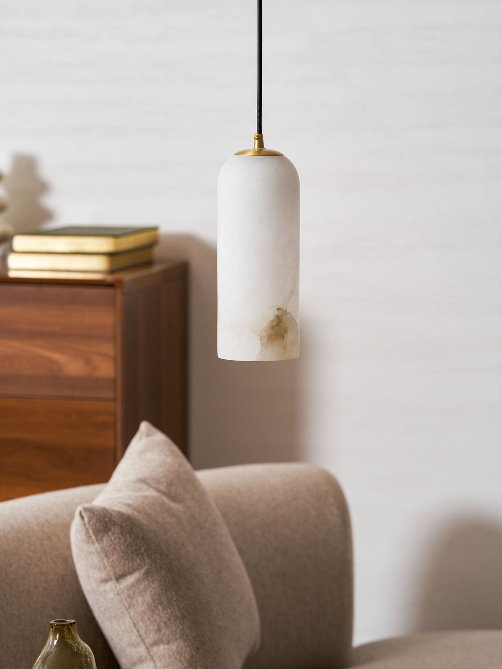 Monty alabaster pendant cluster glowing in an interior