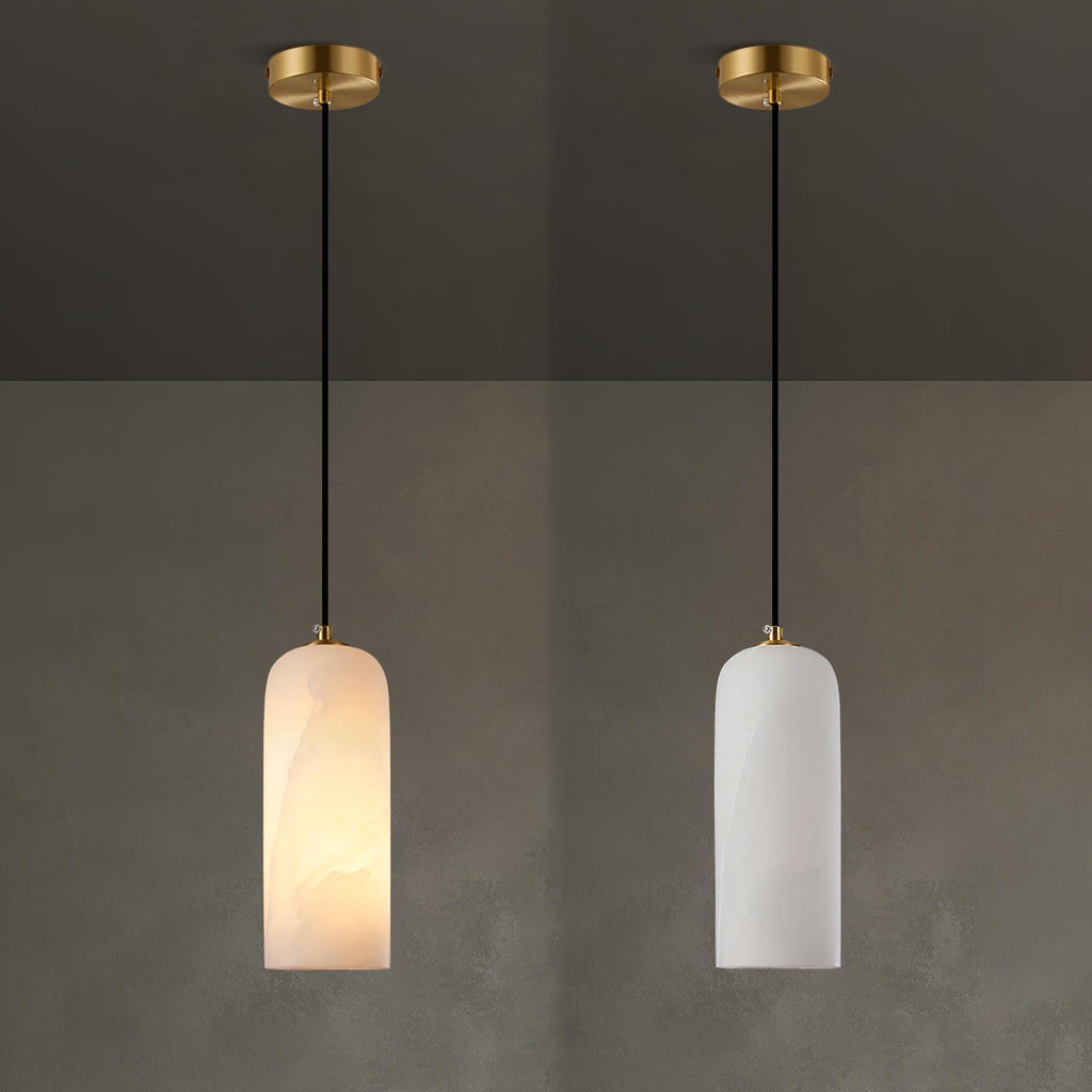 Two Hecate pendants on brass ceiling plates compared side by side: one lit warm, one unlit cool white.
