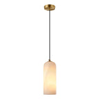 Monty alabaster pendant cluster glowing warm overhead