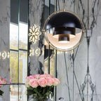 Multi-Lite pendant light in a chrome finish reflecting the surrounding room