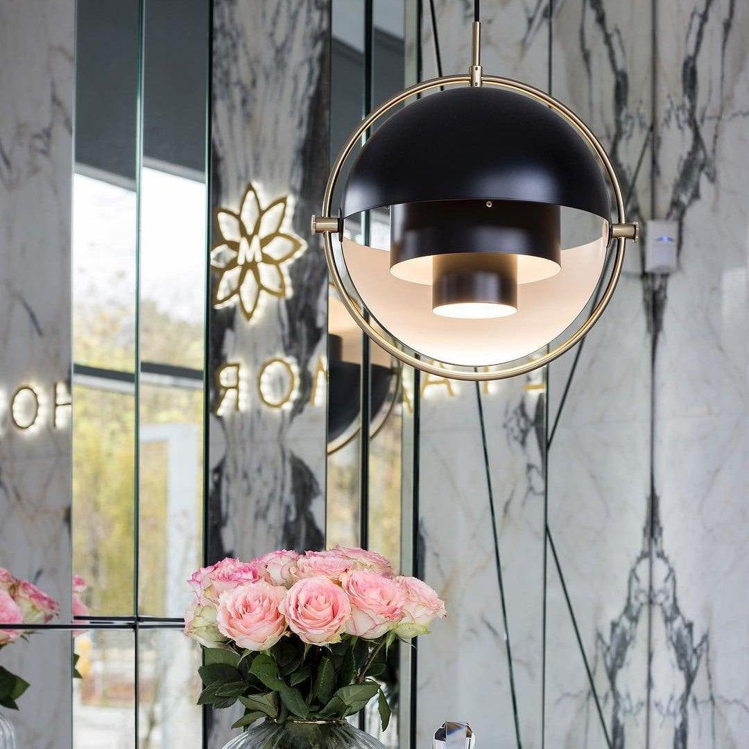Multi-Lite pendant light in a chrome finish reflecting the surrounding room
