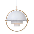 Multi-Lite pendant light in a copper finish suspended above a seating area