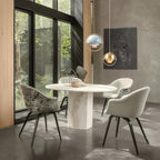 Multi-Lite pendant light with two movable hemisphere halves hanging in a styled interior