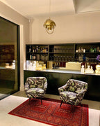 Multi-Lite pendant light over a dining table casting a focused downward pool of light