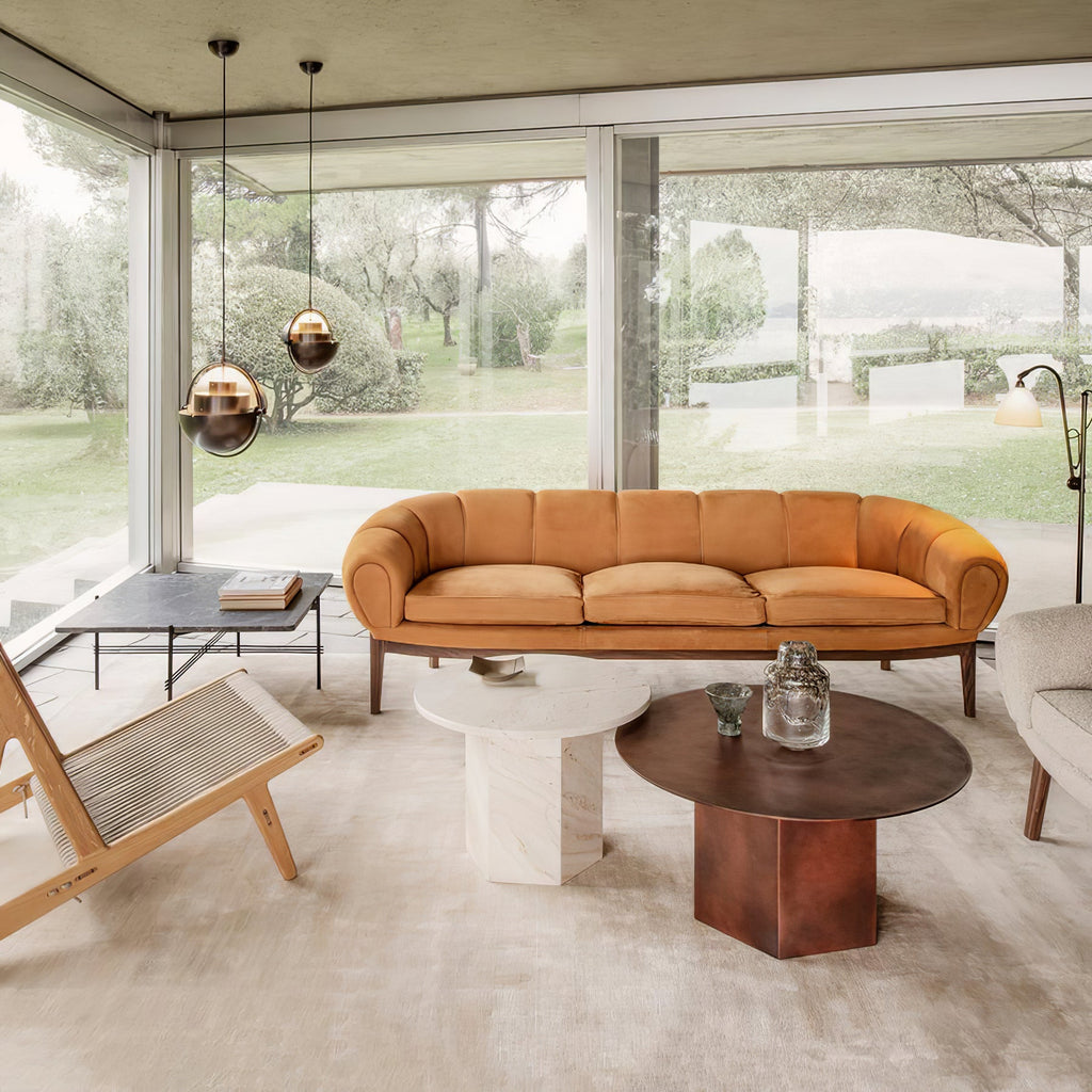 Multi-Lite pendant light in a copper finish suspended above a seating area