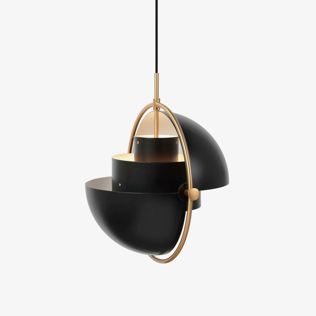 Multi-Lite pendant light over a dining table casting a focused downward pool of light