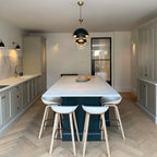 Multi-Lite pendant light shown from below highlighting the adjustable shade halves