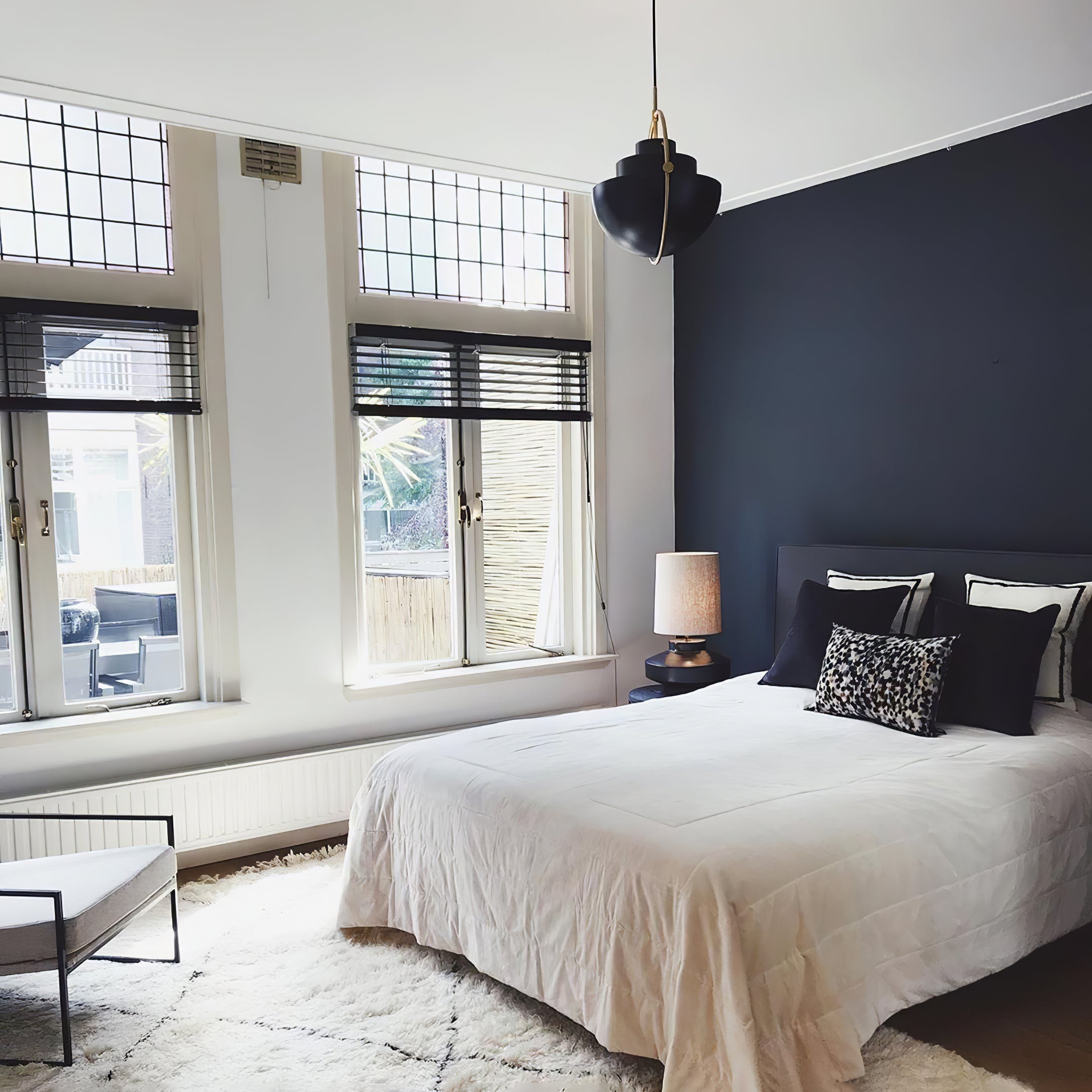 Multi-Lite pendant light shown with the shade halves turned for a soft ceiling glow