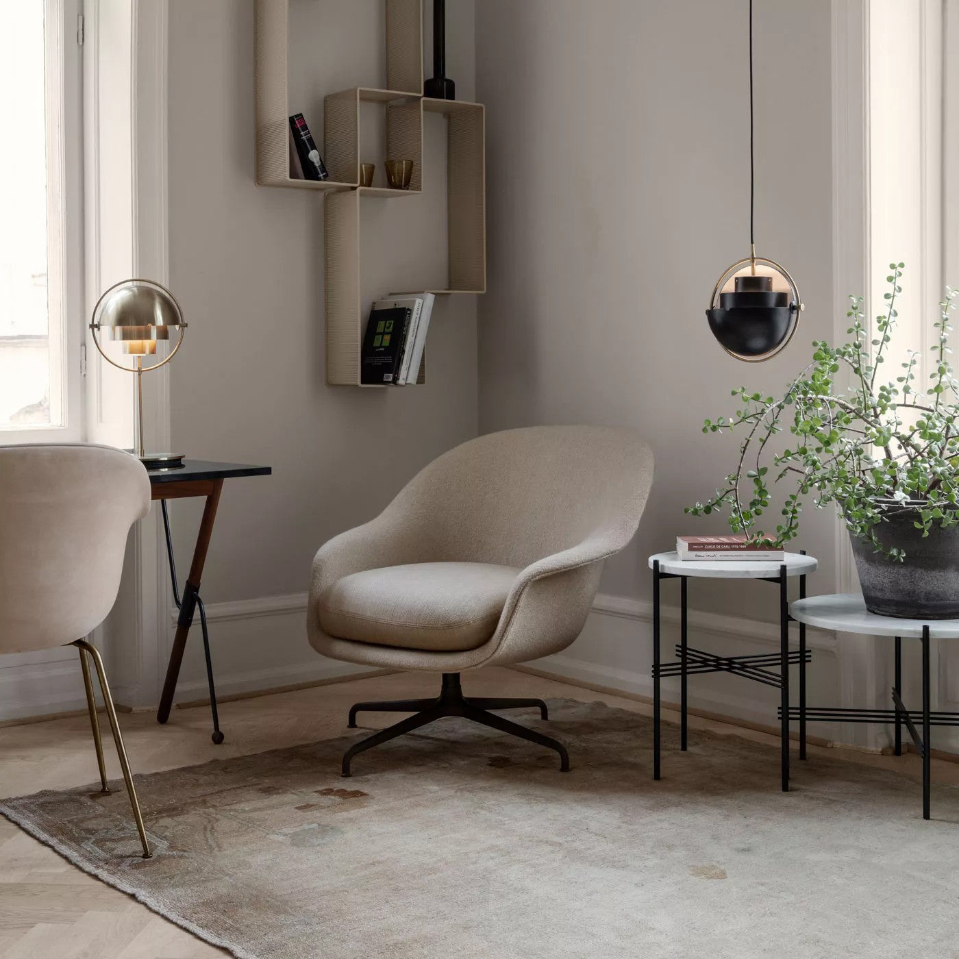 Multi-Lite pendant light over a dining table casting a focused downward pool of light