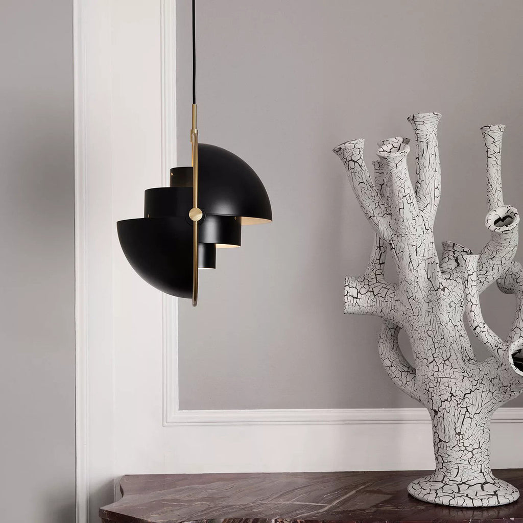Multi-Lite pendant light shown with the shade halves turned for a soft ceiling glow