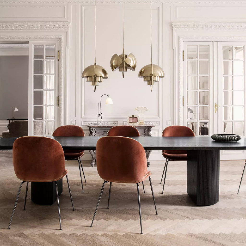 Multi-Lite pendant light shown from below highlighting the adjustable shade halves