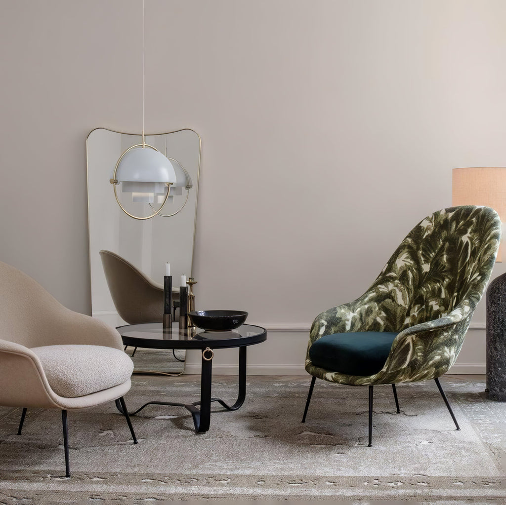 Multi-Lite pendant light over a dining table casting a focused downward pool of light