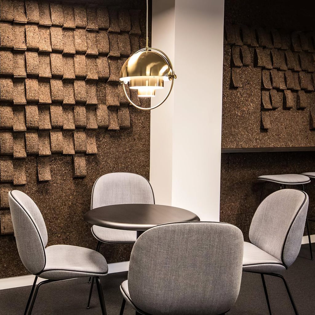 Multi-Lite pendant light in a chrome finish reflecting the surrounding room