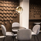 Multi-Lite pendant light in a chrome finish reflecting the surrounding room